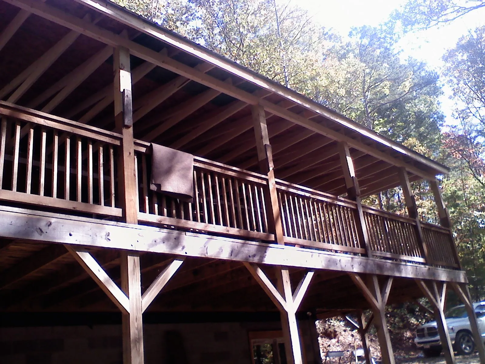 Timber framing under a new elevated porch and deck — Roof Leak Repair in Clinton Township by Roofing Brothers